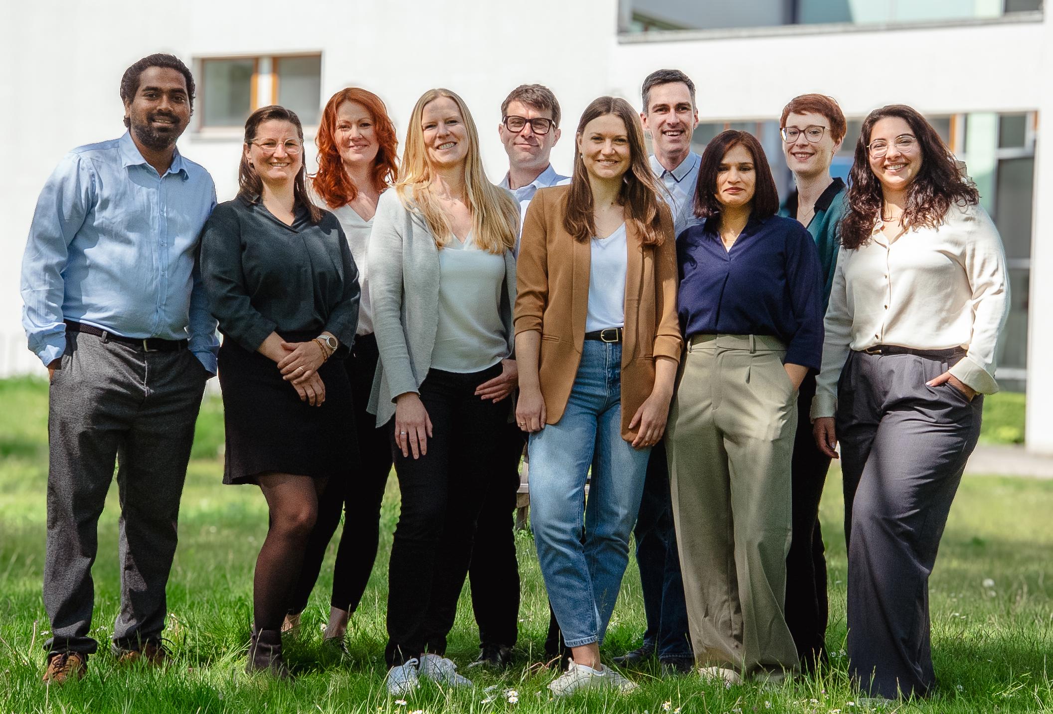 Group photo of an interdisciplinary team of experts in radiochemistry, translational biology, and pharmacology with extensive experience in radiopharmaceutical and targeted oncology development.